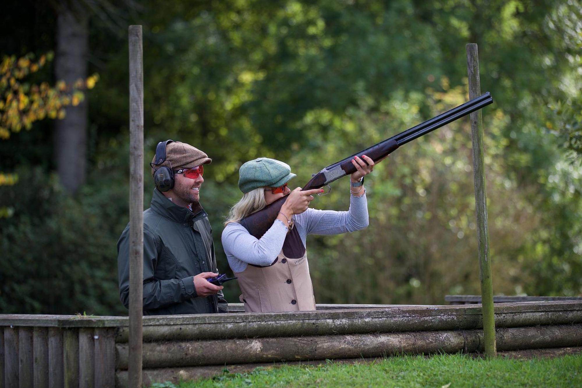 Schloss Roxburghe, Part Of Destination By Hyatt Exterior foto A woman shooting with a shotgun